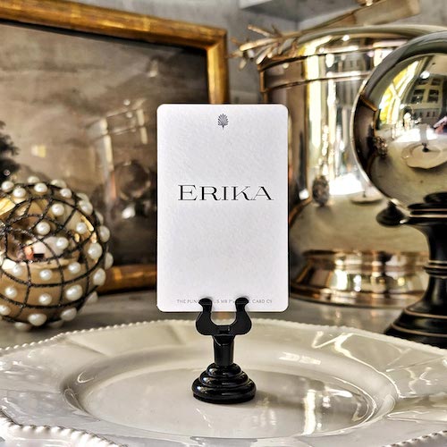 showing the back of the punctilious mr. p's place card co with the name 'Erika' printed in Mr. p's 'Finch' font