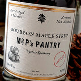 a close up of the bottle label of The Punctilious Mr. P's Pantry speakeasy bourbon maple syrup