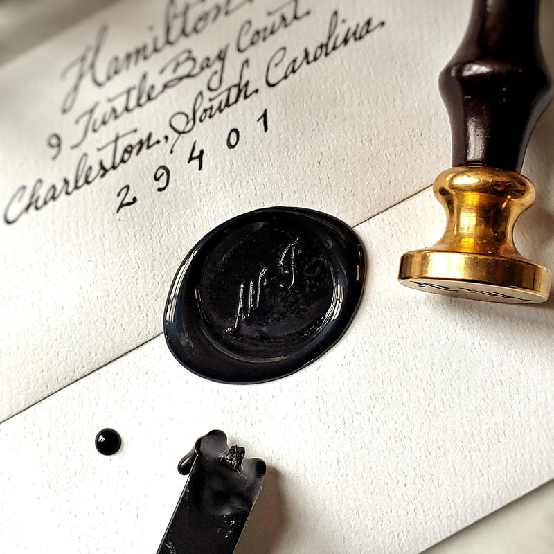 The Punctilious Mr. P's Place Card Co. signature wax seal profile view of wooden handle and brass seal head