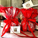 Mr. P's Pantry's jam trio "bouquet" features 3 jams wrapped in red tissue paper and cellophane that closely resembles a bouquet of flowers, showing both kisses and the lover's eye gift note.
