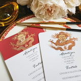 The Punctilious Mr. P's Place Card Co. "Radiant Dragon" menu card featuring a golden-hue dragon on a chinoiserie set of china with golden chop sticks