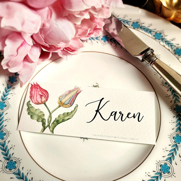 The Punctilious Mr. P's place card co. 'Parrot Tulips' laydown size custom place cards on black and gold china tablescape with fresh flowers and vintage silver cutlery