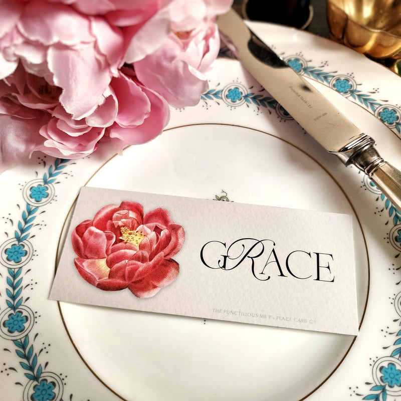 The Punctilious Mr. P's place card co. 'Peony' laydown size custom place cards on black and gold china tablescape with fresh flowers and vintage silver cutlery