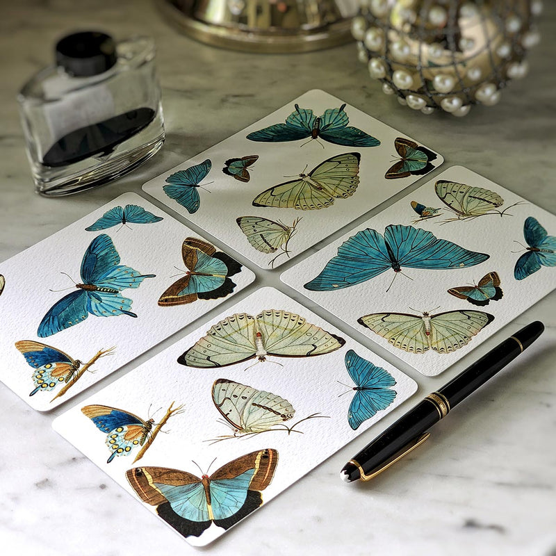 showing all 4 themes in a pack of the punctilious Mr. P's place card co. 'Blue Butterflies' custom Note Cards