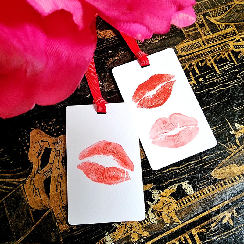 The Punctilious Mr. P's Place Card Co. 'Kisses' custom Gift Tags on a chinoiserie table