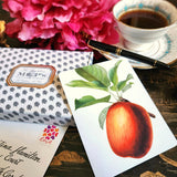 The Punctilious Mr. P's Place Card Co. 'Apple Medley' custom note card pack with a montblanc fountain pen on a chinoiserie table with cup of tea and large beautiful peony flower