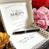 Interior branding of a pack of Mr. P's fine note cards showing their logo: welcome to the marvelous world of the punctilious mr. p's place card co and their brand motto: celebrate, cherish, connect