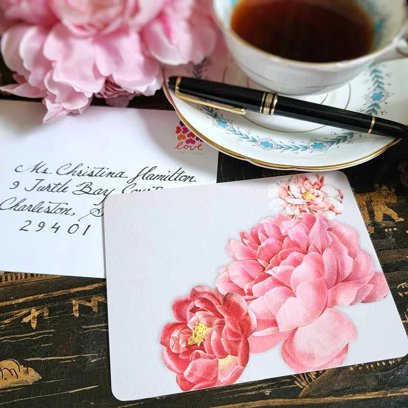 The Punctilious Mr. P's Place Card Co. 'Peony' custom note card pack with a montblanc fountain pen on a chinoiserie table with cup of tea and large beautiful peony flower