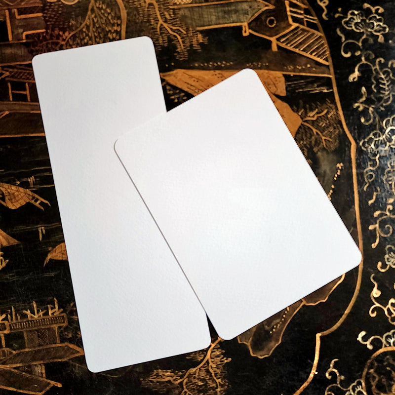 The Punctilious Mr. P's Place Card Co. menu cards showing the Mayfair and Bistro sizes next to one another on a chinoiserie table