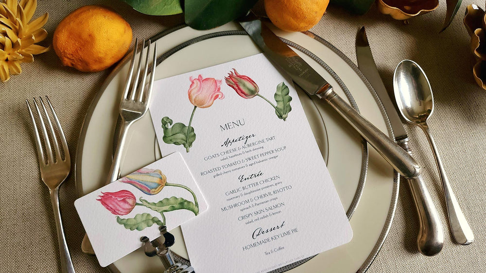 The Punctilious Mr. P's place card co parrot tulip place cards and custom menus on chic tablescape