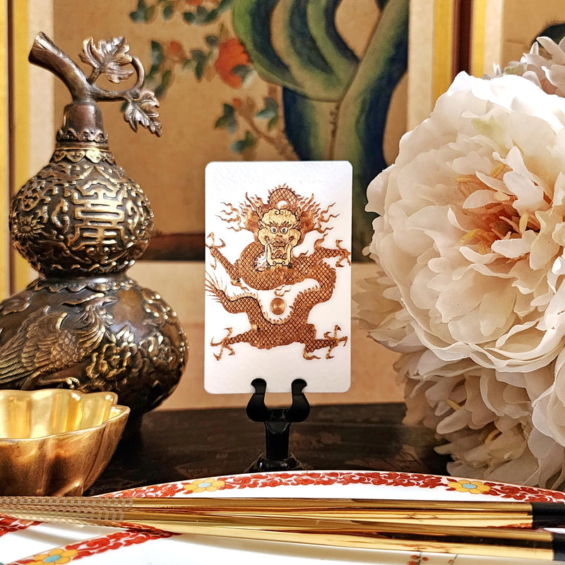 The Punctilious Mr. P's Place Card Co. 'Radiant Dragon' Custom Place Cards on a chinoiserie inspired table with flowers and chop sticks