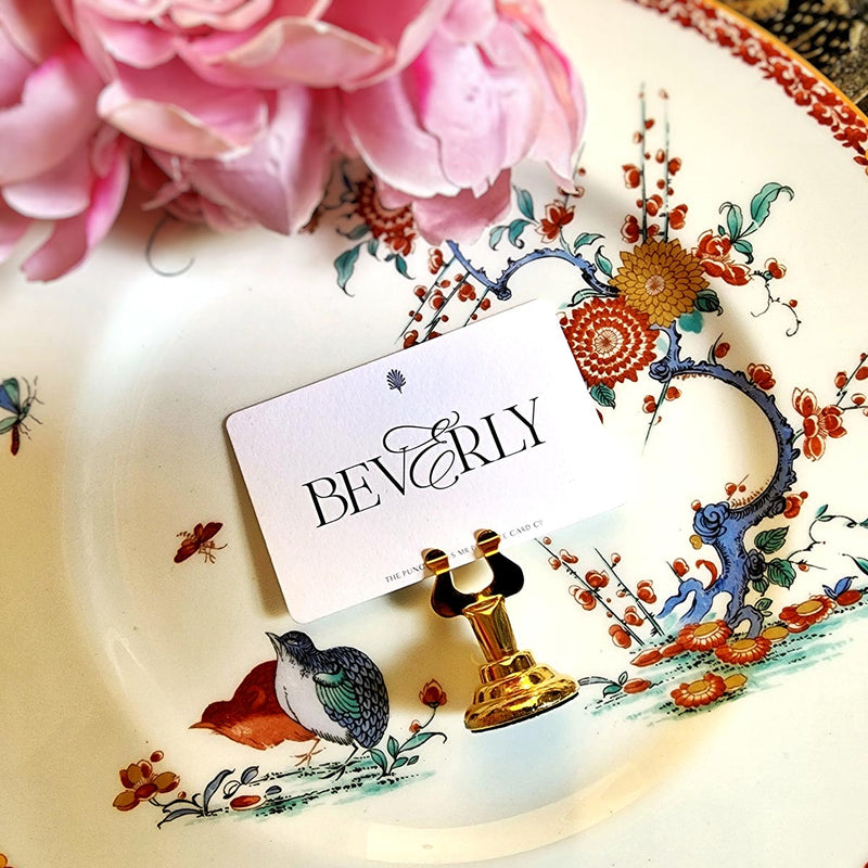 showing the back of The Punctilious Mr. P's custom Place Card with digital calligraphy on chinoiserie plate with flowers around