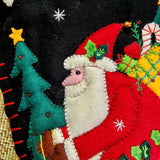 detail of THE PUNCTILIOUS MR. p's place card co. skiing santa christmas stocking of santa skiing downhill in a winter wonderland scene on a tapestry rug