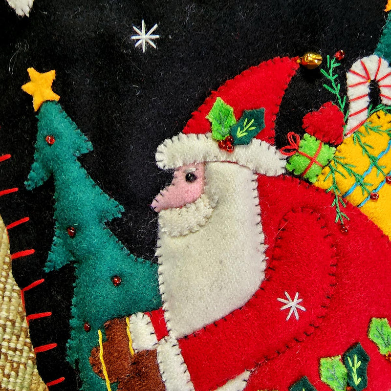 detail of THE PUNCTILIOUS MR. p's place card co. skiing santa christmas stocking of santa skiing downhill in a winter wonderland scene on a tapestry rug