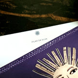 detail of the personalization of the name in the simple smaller font printed at the top of the note card's marquee just below sarah's small sun face logo