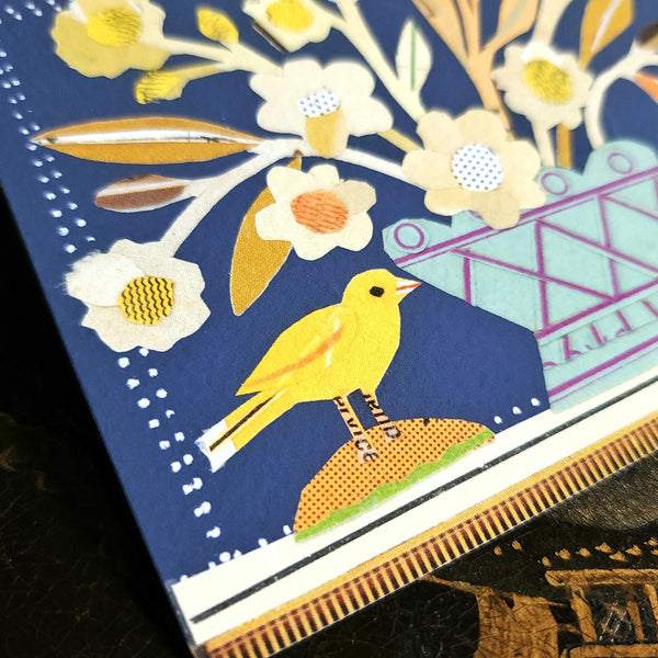 detail of The Punctilious Mr. P x Sarah V Battle "Red Birds" fine note card set featuring collage reproductions of her original artwork, on chinoiserie table.