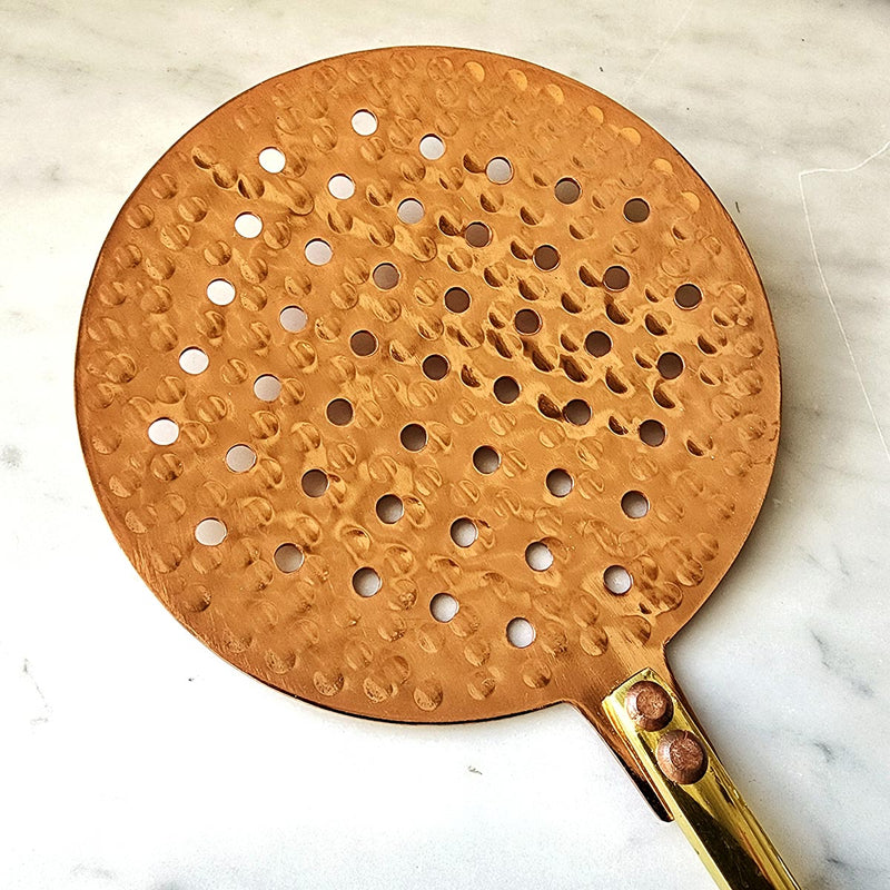 detail of Mr. P's Pantry Copper-Brass Strainer