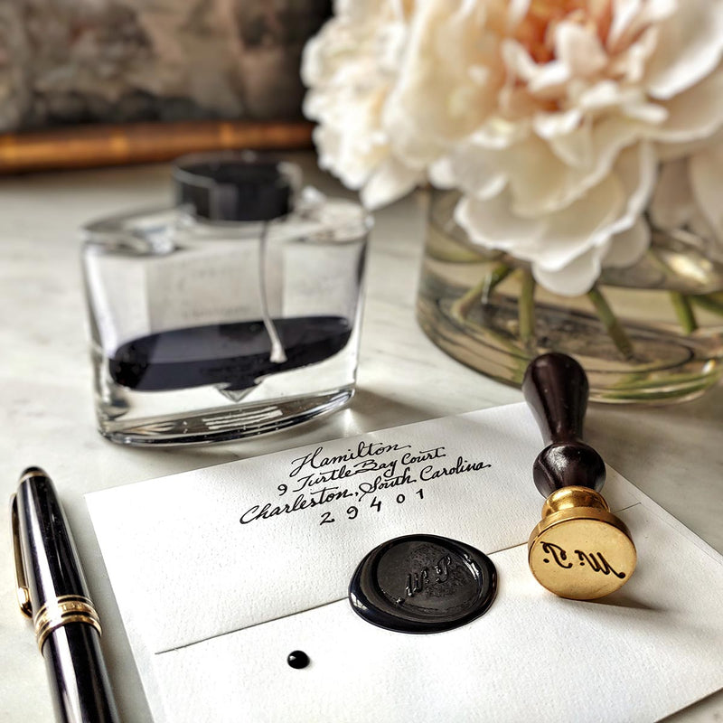 The Punctilious Mr. P's Place Card Co. Custom Wax Seal in ink bottle