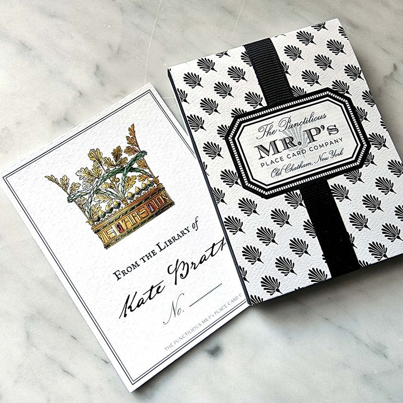 Showing the punctilious Mr. P’s Place Card Co. bookplate next to their iconic black and white anthemion packaging and stacked frame label sealed with black grosgrain ribbon