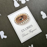 The Punctilious Mr. P's Place Card Co. personalized "The Lover's Eye- noir" motif bookplate in the "Ex Libris" style.
