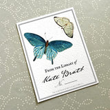 The Punctilious Mr. P's Place Card Co. personalized "blue butterflies" motif bookplate in the "from the library of" style.