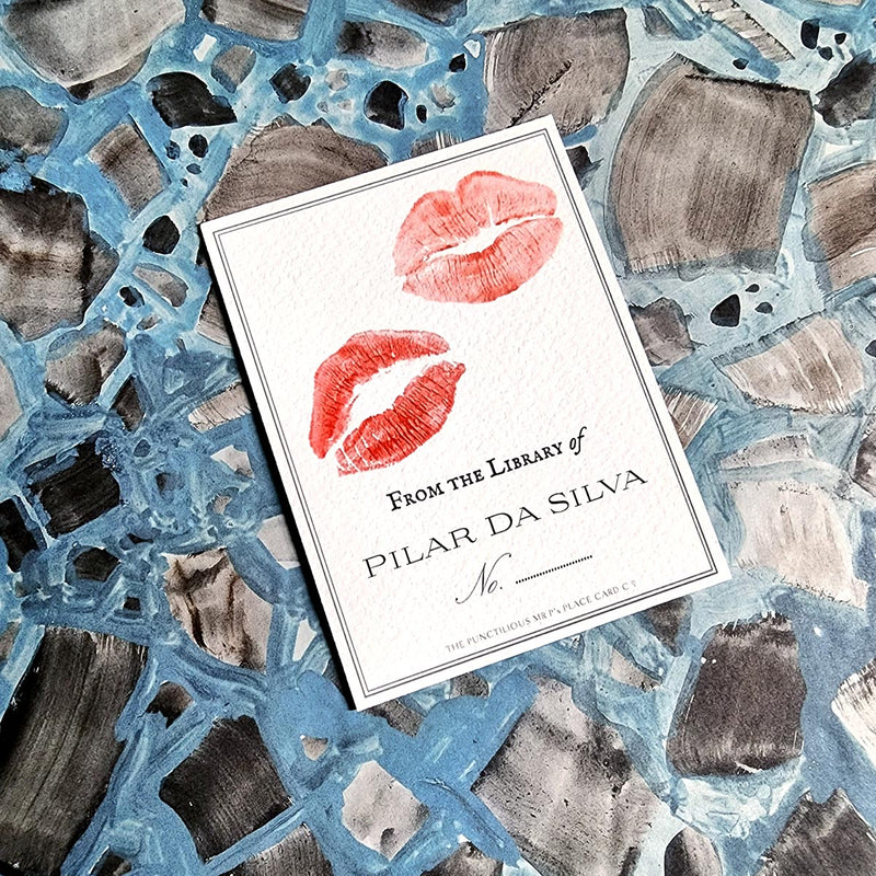 The Punctilious Mr. P's Place Card Co. personalized "Kisses" motif bookplate in the "from the library of" style.