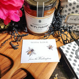 The Punctilious Mr. P's Place Card Co. "Bees" Custom Gift Notes on a chinoiserie table with marmalade jam, cutting board and fresh flowers