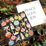 The Punctilious Mr. p's place card co. collab with sarah v battle showing the ornaments and back of holiday card that reads: peace, love, joy