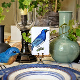 The Punctilious Mr. P's Place Card Co. blue 'Chromatic Cuckoo' custom place cards on a beautiful tablescape