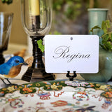 showing the back of The punctilious Mr. P's place card co. with guest's name in spencerian digital calligraphy