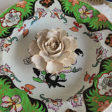 video of Handcrafted petite ivory ceramic peony blossom with golden-tawny edges from The Punctilious Mr. P's Place Card Co.