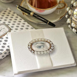 The Punctilious Mr. P's place card co. 'lovers eye- pearl' custom note card pack with a montblanc fountain pen on a cup of tea