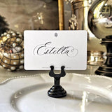 showing the back of the punctilious mr. p's place card co with the name 'Estella' printed in Mr. p's 'Calliope' font