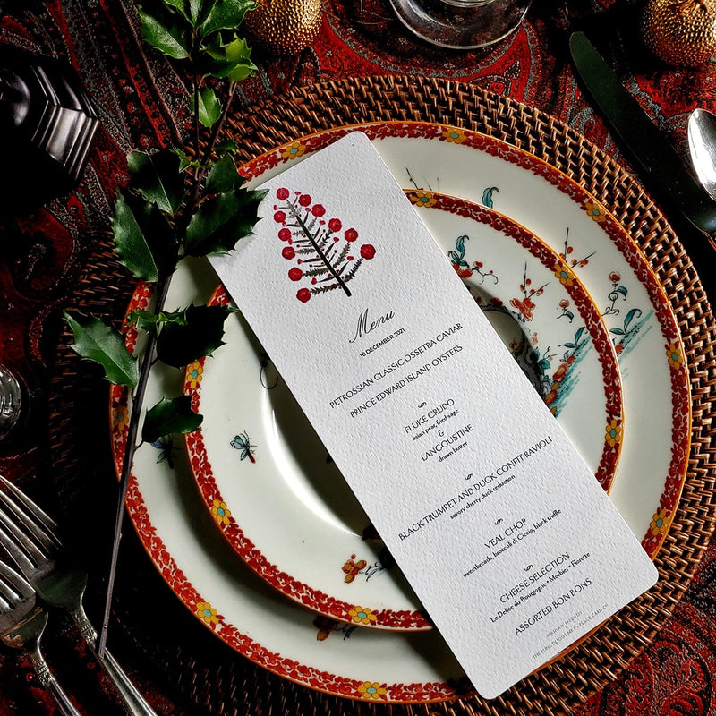 Marian Mcevoy (aka Gust the Poodle) for The Punctilious Mr. P's Place Card Co. 'Tanenbaum' bistro size custom menu card on top of chinoiserie dinner plate set for christmas tablescape
