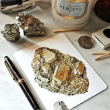 The Punctilious Mr. P's place card co. 'Minerals No. 2' custom note card set on marble ledge with crystals on top