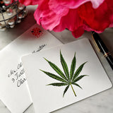 The Punctilious Mr. P's place card co. 'Cannabis' custom note card set on marble ledge with peony flower and fountain pen and addressed envelope