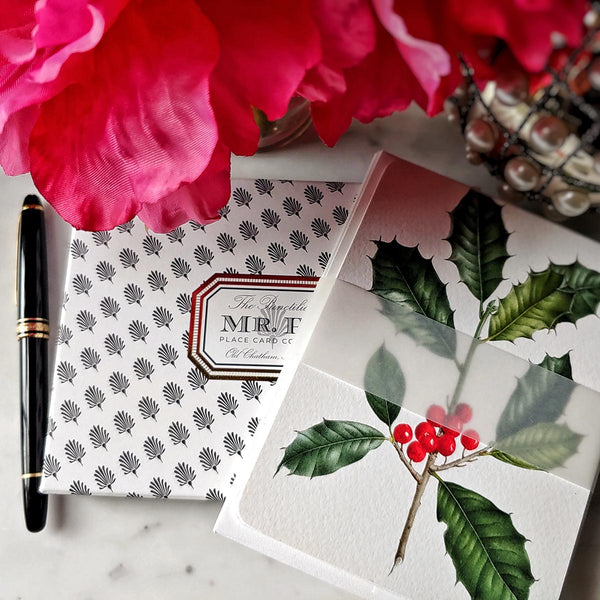 The Punctilious Mr. P's place card co. 'Holly' custom note card set on marble ledge with peony flower and fountain pen