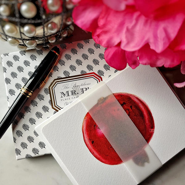 The Punctilious Mr. P's place card co. 'Pomegranate' custom note card set on marble ledge with peony flower and fountain pen