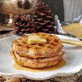 golden brown waffles drizzled with The Punctilious Mr. P's Pantry pure maple syrup