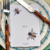 The Punctilious Mr. P's Place Card Co. coordinating 'Bees' custom menu cards on a beautiful spring table set with menu cards and chic bamboo cutlery