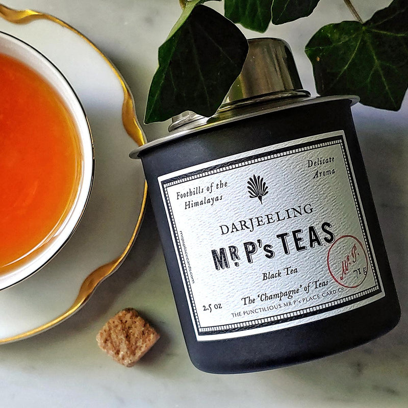 The Punctilious Mr. P's Place Card Co. Darjeeling black Tea canister with tea cup and saucer