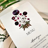 detail of the purple poppy motif found at the top of marian mcevoy's bistro Custom menu cards for mr. p's