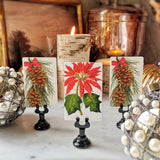 The Punctilious Mr. P's place card co. 'Poinsettia' custom place cards paired with Coulter Pine Cones