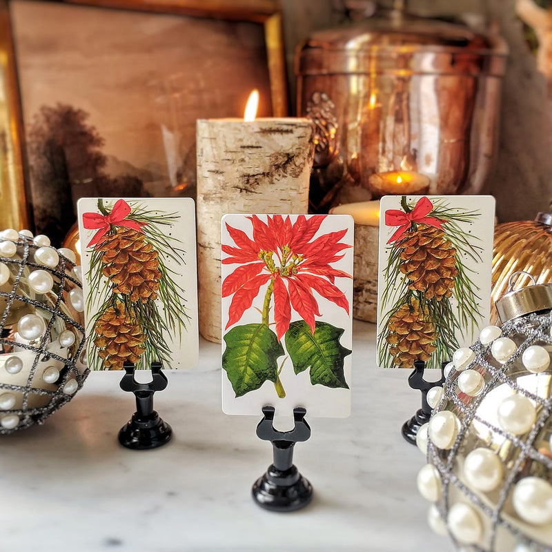 The Punctilious Mr. P's place card co. 'Poinsettia' custom place cards paired with Coulter Pine Cones