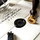 The Punctilious Mr. P's Place Card Co. anthemion wax seal profile view of wooden handle and brass seal head