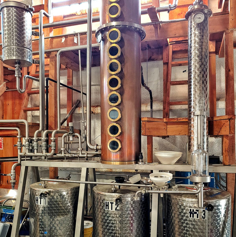 stainless steel kettles and tubes at Harvest Spirits Distillery