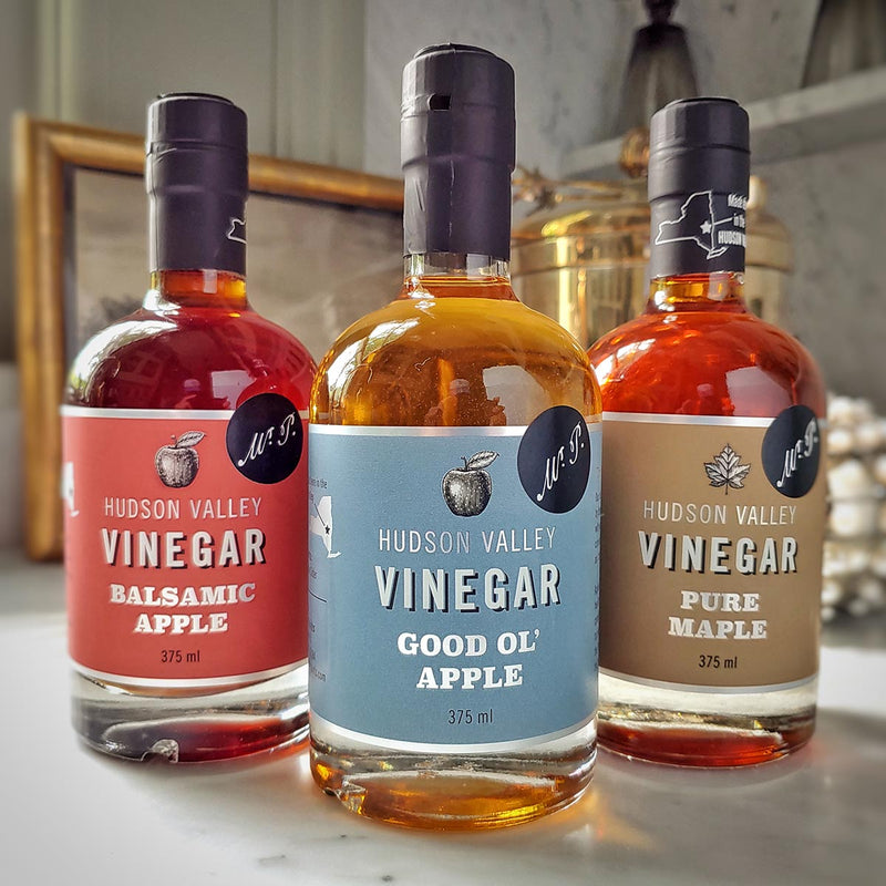 bottles of Harvest Spirits balsamic apple vinegar, good ol' Apple Vinegar and Pure Maple vinegar