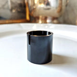 The Punctilious Mr. P's Gold Barrel Place Card Holder in black finish